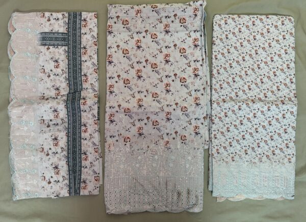 Unstitched lavender grey lawn suit featuring digital printed body, boring work hemline, scalloped dupatta, and boring work salwar
